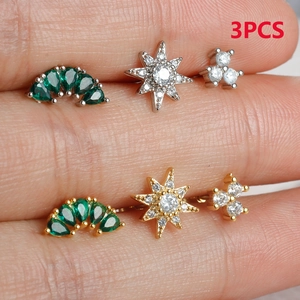 Detailed set of 3 zircon earrings in gold and silver finish held to show actual size