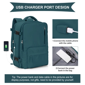Detail showing the USB charger port design on the dark cyan travel backpack