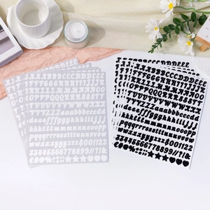 Detailed view of black and white 0.5 inch self-adhesive alphabet vinyl stickers for DIY crafts