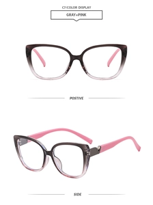 Detail view of cat eye blue light glasses featuring grey and pink gradient frames