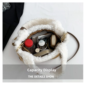 Top view showing internal capacity of the white sherpa tote bag with daily items