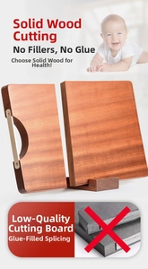 Detail of solid ebony wood cutting board with natural grain and metal handle