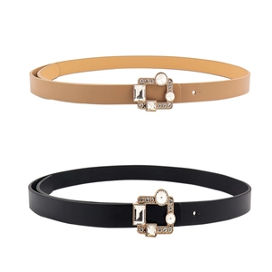 Close-up of black and khaki PU leather belts with decorative rhinestone square buckles