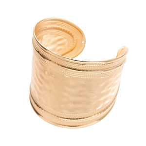 Golden textured wave bangle with hammered finish and beaded edges in a wide open design