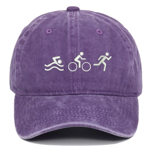 Close-up of embroidered triathlon icons on a purple vintage washed cotton baseball cap