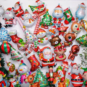 Collection of festive Christmas foil balloons featuring Santa, snowman, and reindeer shapes
