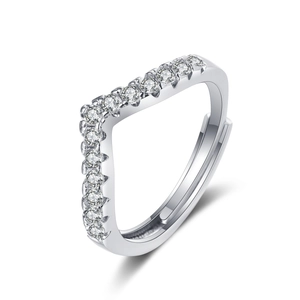 Macro detail of silver V-shape ring with pavé-set zircons and adjustable open band