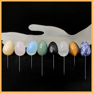 Detailed chart of assorted 30mm gemstone crystal eggs with size and material labels