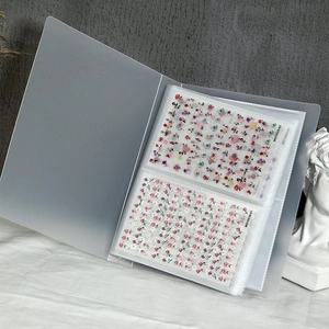 Translucent matte nail sticker album organizer with floral pattern sheets inside