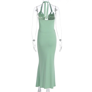 Rear view of light green halter neck bodycon dress showing open back design details