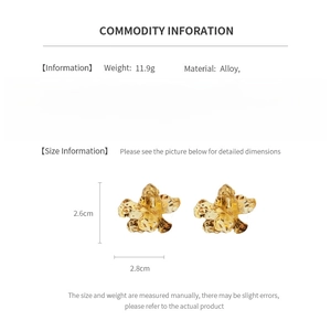 Detailed size and weight specs for vintage gold flower earrings with silver needles