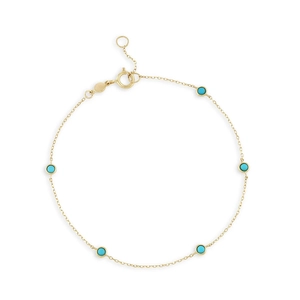 Detail view of gold S925 silver bracelet with five round turquoise stones and spring clasp