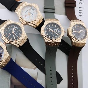 Collection of men's sports watches with octagonal gold cases and multi-color silicone bands