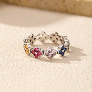 925 silver ring featuring colorful multi-gemstone four-leaf clover charms in a row