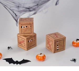 Detail of Halloween pirate wood grain gift box with caution sign and party decor
