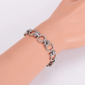 Punk stainless steel O-chain bracelet with hammered rings and polished spheres on wrist