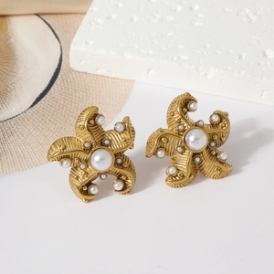 Starfish shaped earrings in gold finish with white pearl center for women