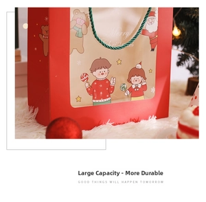 Close-up of red Christmas cutout gift bag with cute cartoon illustrations and green handle