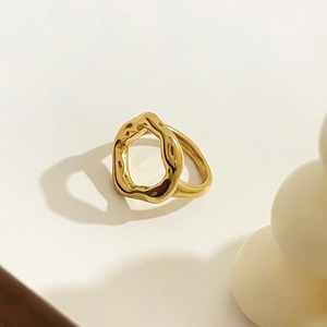 Minimalist 18K gold plated stainless steel ring with irregular lava texture design