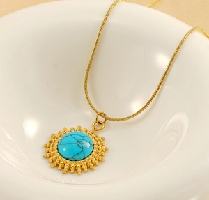 Collier pendentif turquoise rétro avec étoile à huit branches en acier inoxydable.