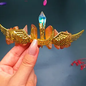 Detailed shot of handmade golden wing crown with vibrant crystal clusters and aurora stones