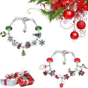 DIY Christmas advent calendar bracelet set with red and green charms in festive holiday packaging