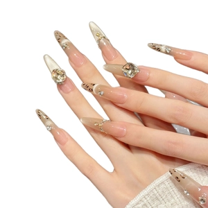 Long almond press-on nails with maple leopard print and sparkling rhinestones