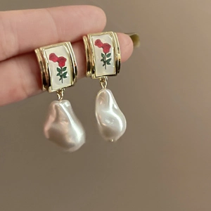 Baroque irregular pearl earrings with red rose pattern in a vintage metallic frame
