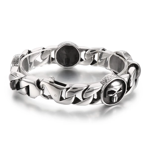 Vintage Cuban chain steel bracelet with 22mm round skull charms and polished finish