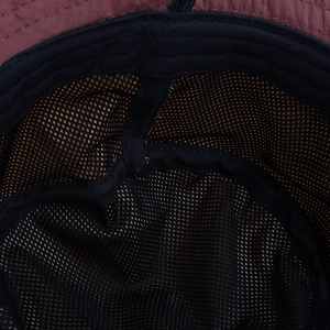 Detail of breathable mesh lining and fine stitching inside this outdoor sun hat
