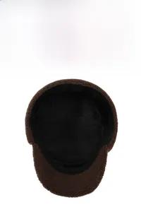 Detail view of the warm black fleece lining inside the dark brown winter trapper hat