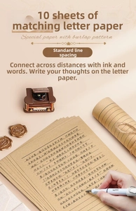 Detailed view of linen texture kraft paper stationery with vintage wax seal and stylus