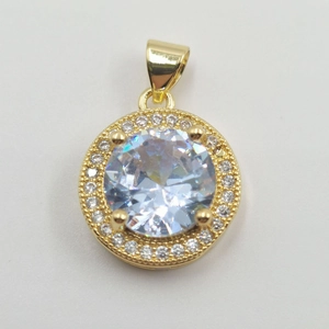 Luxurious gold necklace pendant featuring a large round zircon and sparkling halo accent