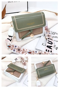 Close-up of color-block crossbody bag with green fringe and floral embroidered strap