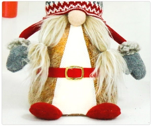 Detail of Swedish gnome plush showing red knit hat, golden belt, and gray faux fur