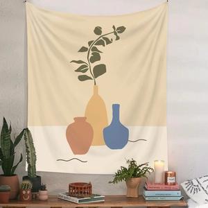 Détail d'une tapisserie murale bohème avec des motifs abstraits dans un décor épuré