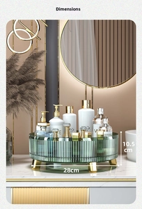 Rotating emerald green cosmetic tray with gold feet and 28cm diameter dimensions