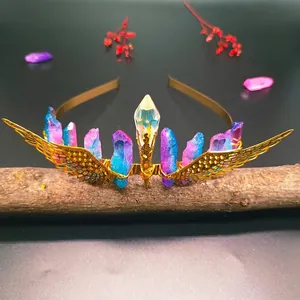 Macro detail of bridal crown with purple crystals and gold wings on a wood log