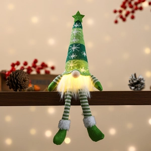 Close-up of a glowing green Christmas gnome doll with star hat on wooden shelf