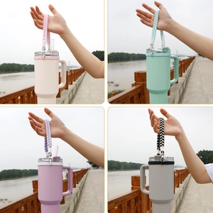 40oz tumbler with woven handle strap in pastel pink, green, purple and grey colors
