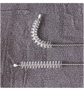 Detail of nylon bristle cleaning brushes with flexible stainless steel twisted wire handles