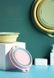 Detail of collapsible washbasins with hanging holes and anti-slip silicone base design