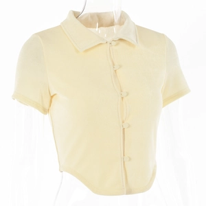 Detail of light yellow slim fit short sleeve cardigan showing collar and buttons