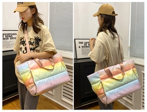 Quilted gradient fitness bag shown from front and side views on a model for size scale
