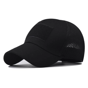 Detail of tactical baseball cap featuring black mesh back and front hook and loop patch