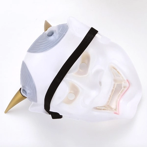 Rear view of white Japanese Hannya Oni mask featuring golden horns and black elastic strap