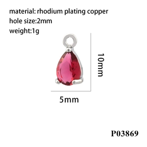 Macro detail of a 10x5mm red teardrop zircon pendant with silver rhodium plated setting