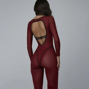 Slim fit burgundy yoga jumpsuit with long sleeves and hollow back with black straps