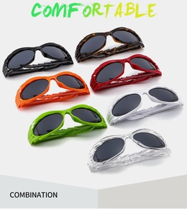 Detail view of colorful wrap-around sports sunglasses with unique textured temples