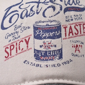 Retro washed cotton baseball cap with vintage spicy sauce graphic print in New York style